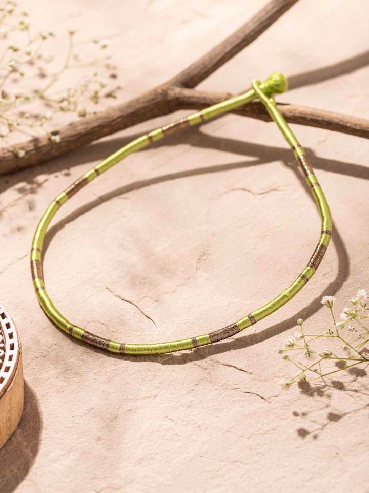 Close-up of Patwa Collar Necklace featuring detailed craftsmanship and ornate decorations.
