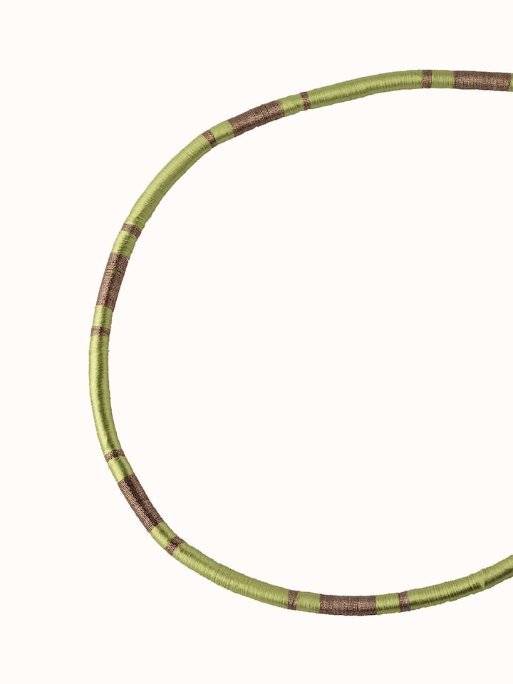 Angled view of Patwa Collar Necklace emphasizing the elegant patterns and vibrant colors.