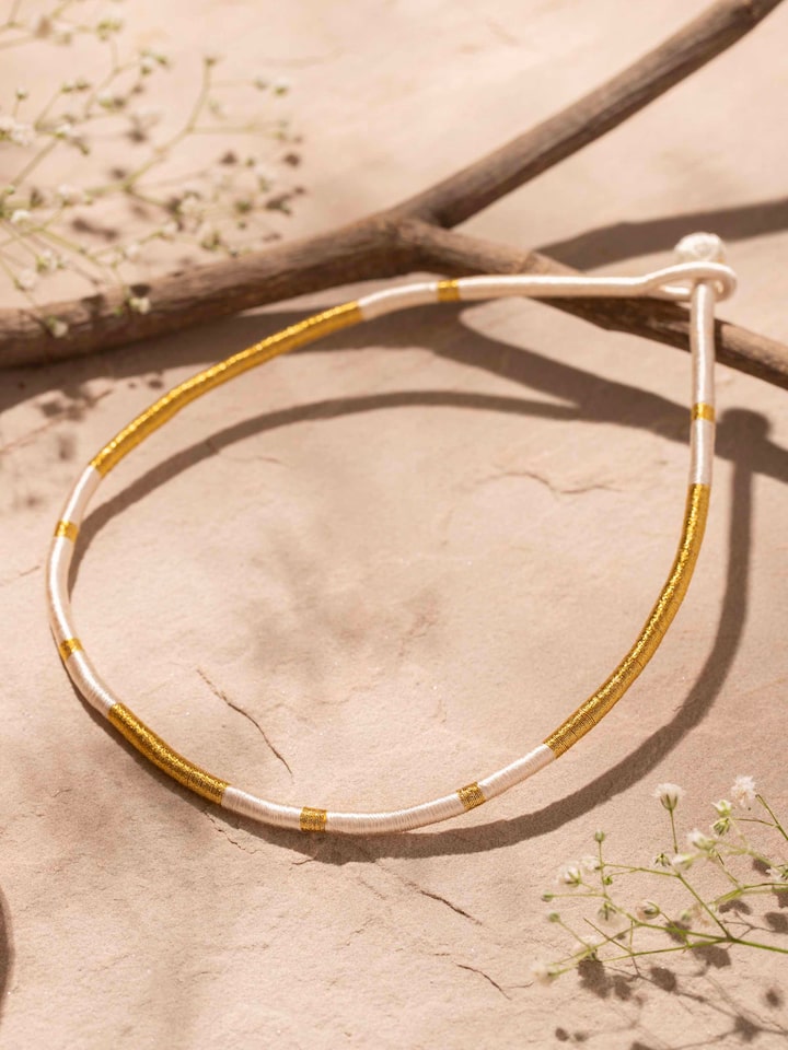 Side view of Patwa Collar Necklace highlighting its elegant curves and detailed craftsmanship