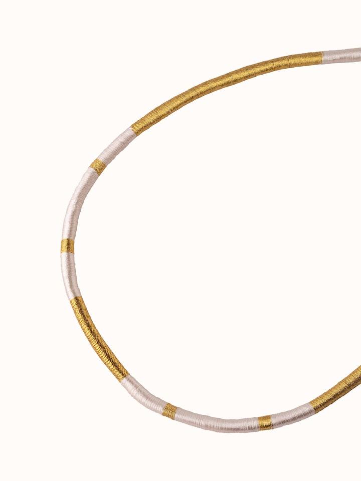 Angled view of Patwa Collar Necklace showcasing its sophisticated design and detailed craftsmanship