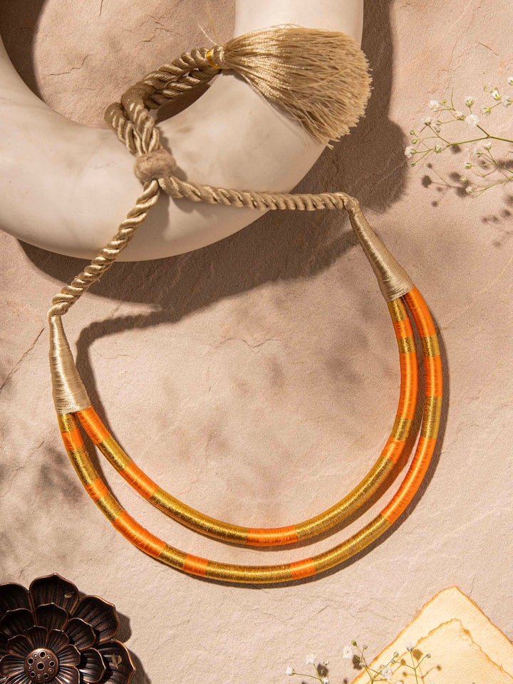 Side view of Crochet Drop Earrings illustrating their unique design.