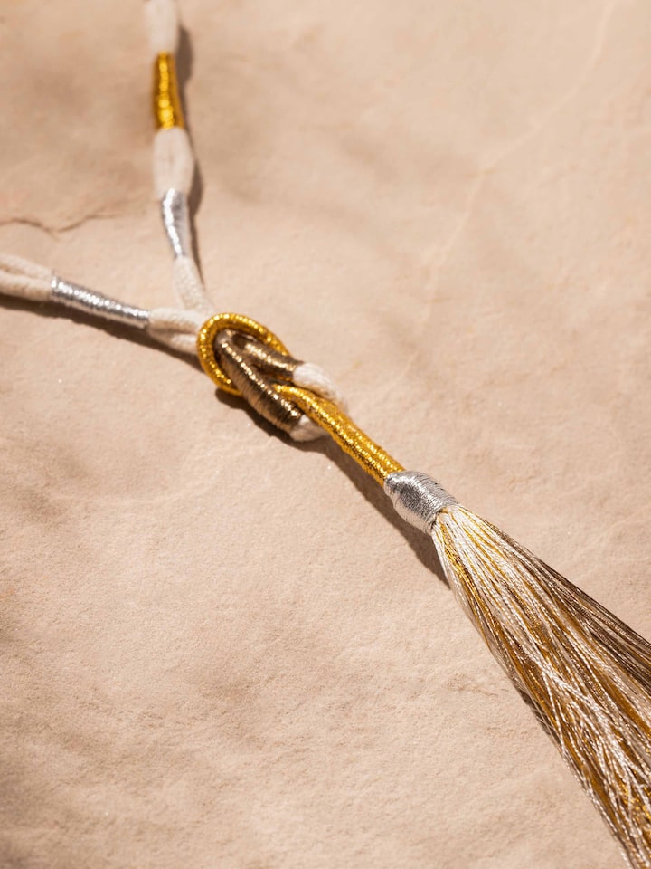 Detailed view of Patwa long necklace focusing on its vibrant beadwork and traditional craftsmanship