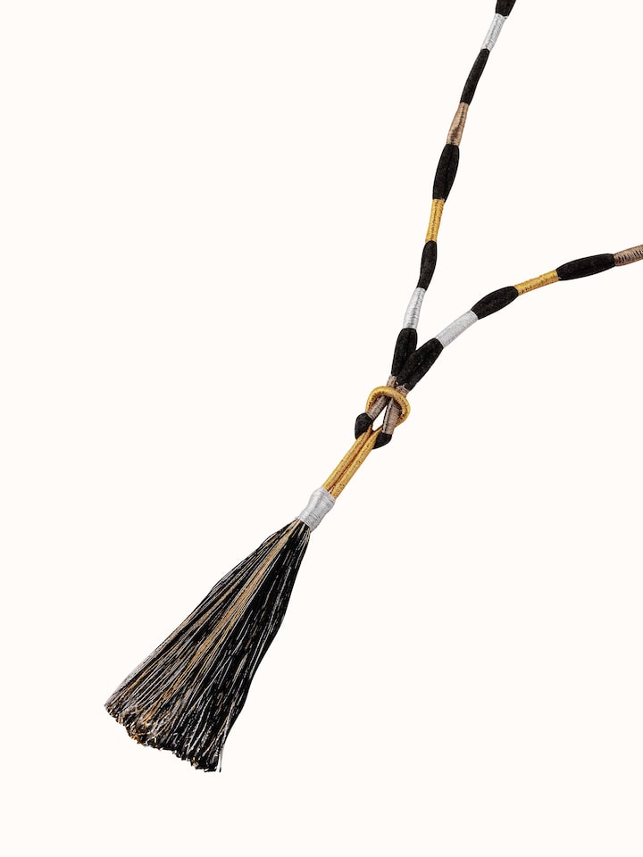 Angled view of Patwa Long Necklace showcasing intricate design and bead arrangement.
