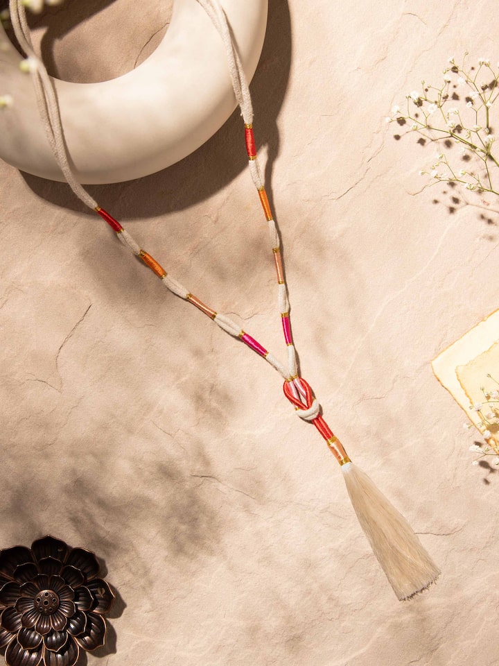Close-up view of Patwa long necklace emphasizing its elaborate beadwork and texture
