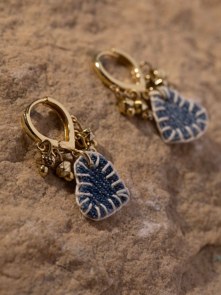 Detail view of Upcycled Drop Earrings highlighting the stone setting and metalwork detail