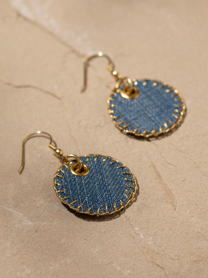 Detail view of Upcycled Drop Earrings highlighting the stone setting and metalwork detail