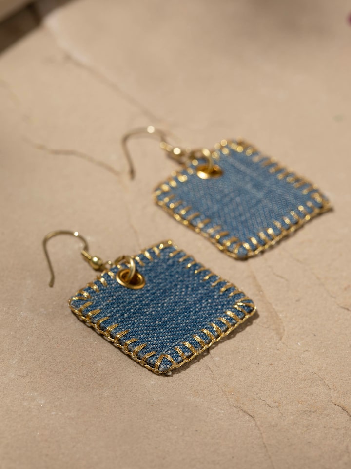 Detail view of Upcycled Drop Earrings highlighting the stone setting and metalwork detail