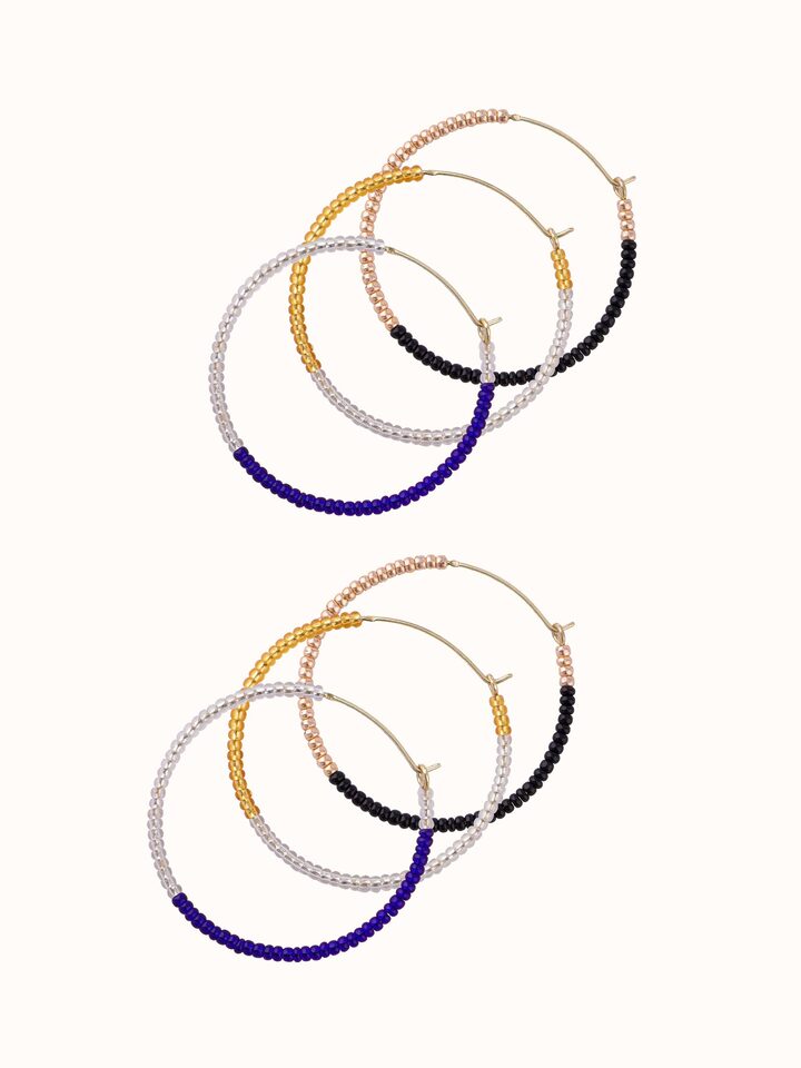Overhead view of handcrafted earrings displaying overall shape and design