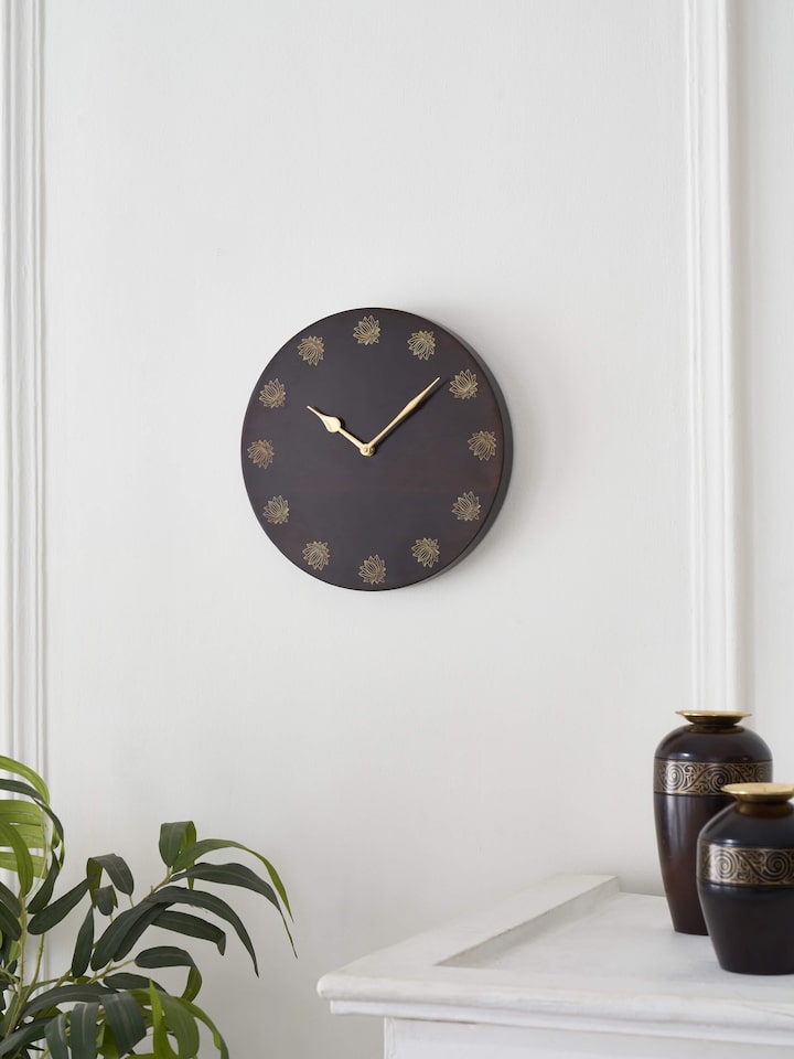 Side view of natural tarkashi sheesham wood & brass wall clock, emphasizing the craftsmanship and finish.