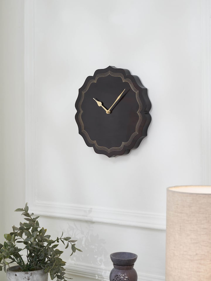 Side view of Handcrafted Tarkashi Sheesham Wood & Brass Wall Clock, showcasing the elegant design and finish