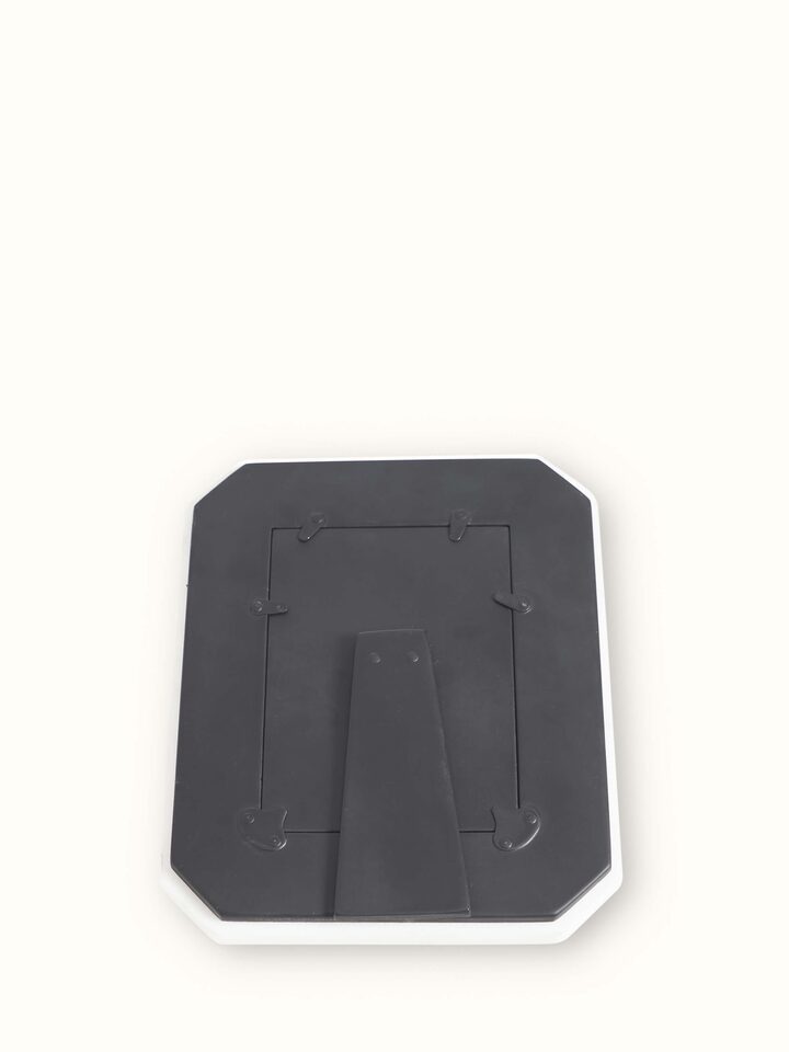 Detailed view of Pacchikari marble photo frames in white color emphasizing design and texture