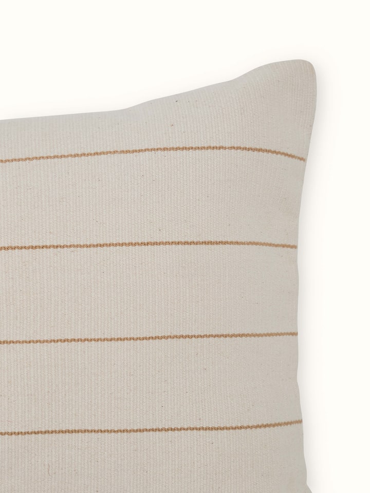 Detailed view of Ridhama white Kalinda cotton Naga handloom cushion cover showing its craftsmanship and texture.
