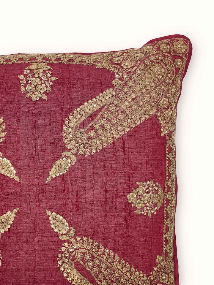Close-up view of Alankar Maroon Paisley Silk Zardozi Hand Embroidered Cushion Cover highlighting the weave and stitch detail