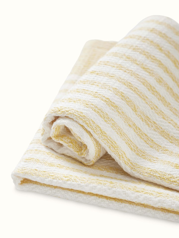 Full view of Vayana Stripe Yellow Cotton Hand Towels (2 pcs), showcasing the towel's striped design and texture.