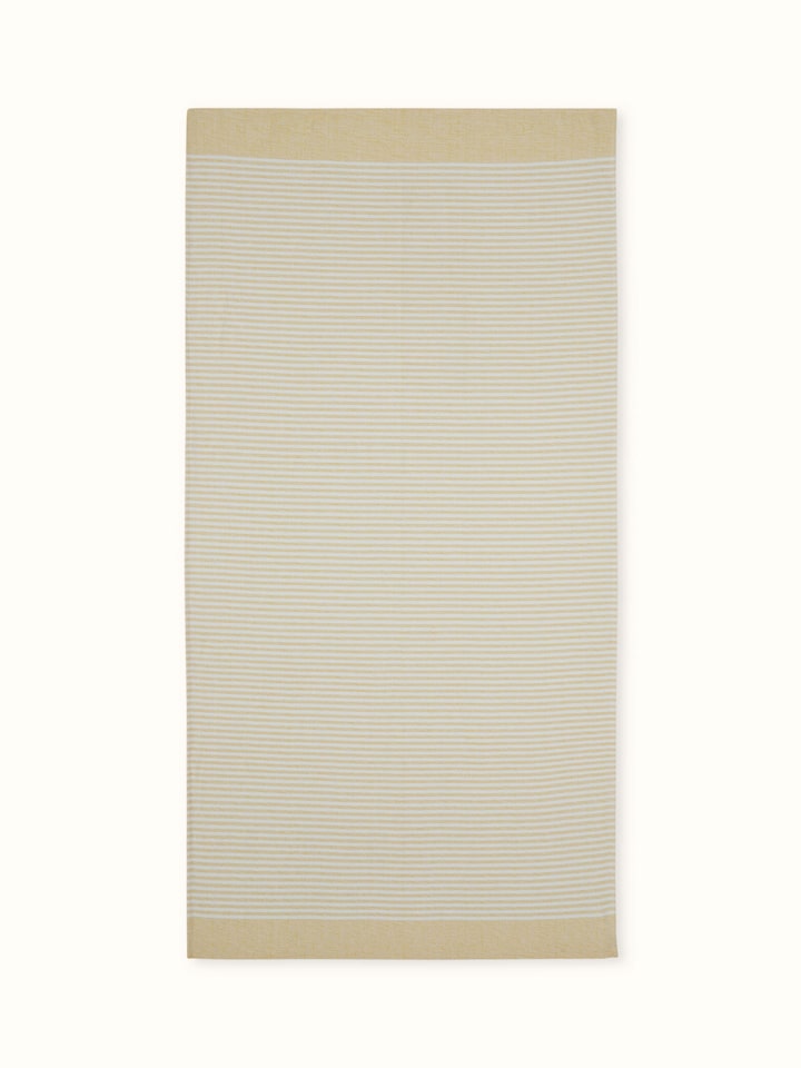 Full view of Vayana solid yellow cotton bath towel (XL) showcasing its bright yellow color and large size