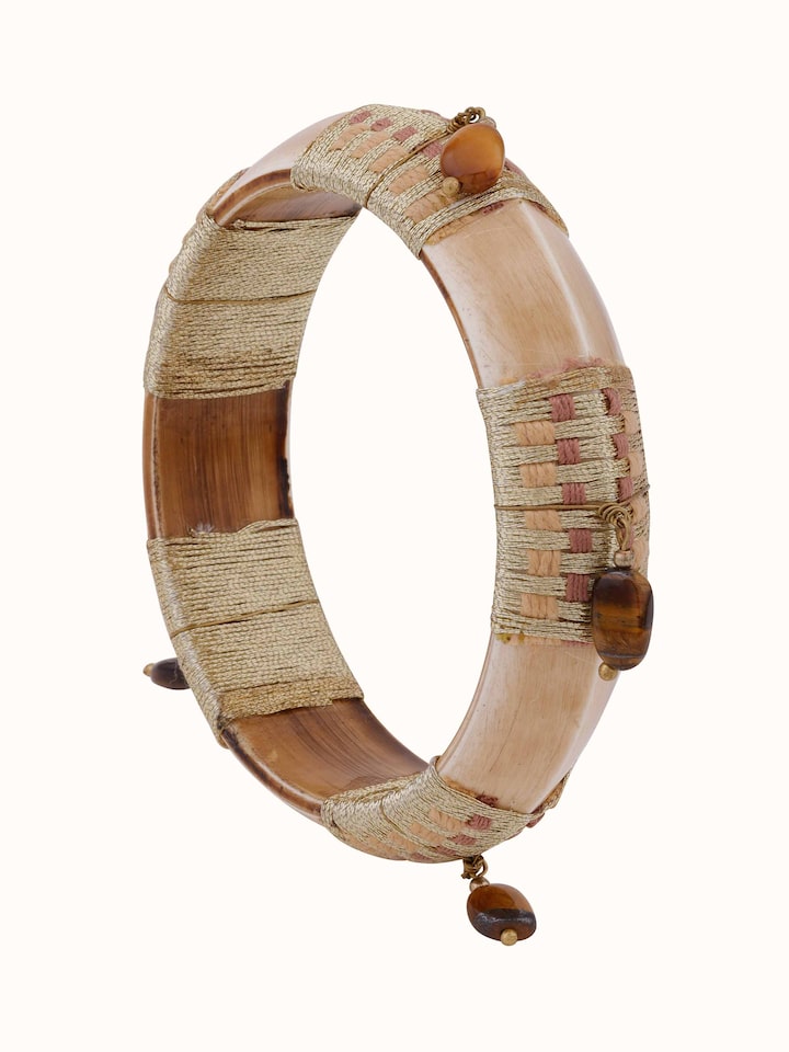 Angled view of Handcrafted Flexible Bracelet showcasing the intricate design and craftsmanship.