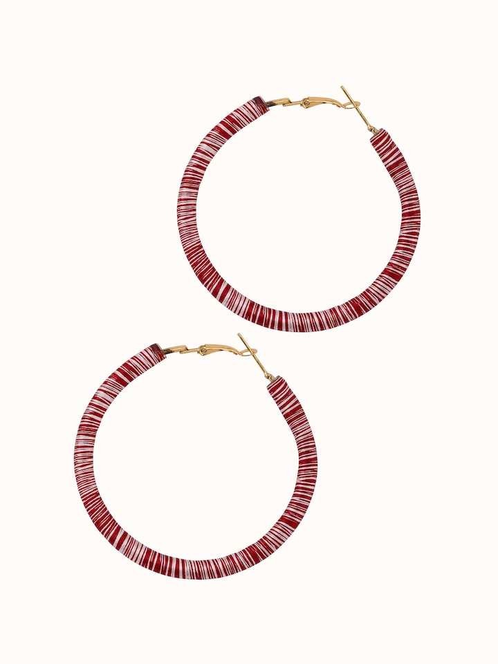 Angled view of Handcrafted Hoop Earrings highlighting the stylish design.