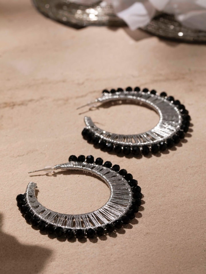 Back view of Handcrafted Hoop Earrings showing the clasp and hoop design.