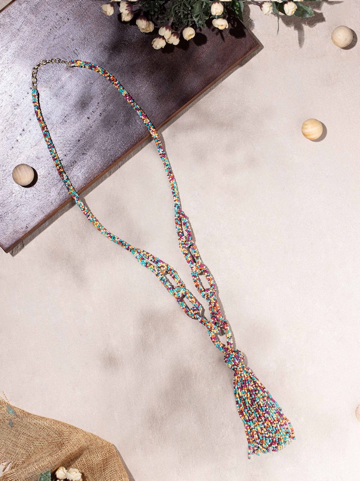 Side view of Handcrafted Long Necklace displaying its length and detailed design.