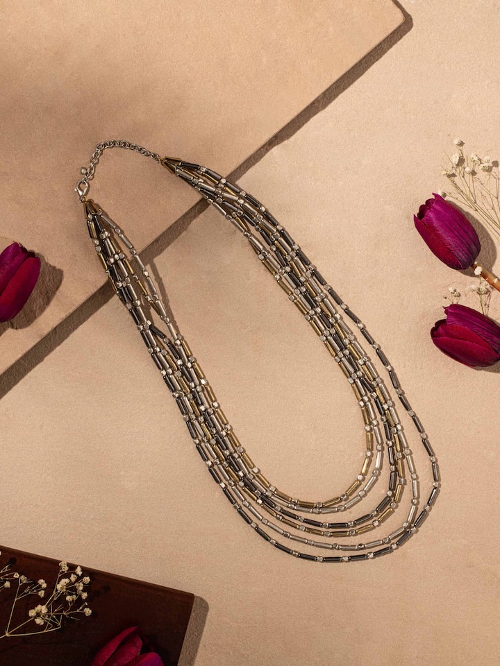Close-up view of handcrafted collar necklace emphasizing its fine details and elegant design