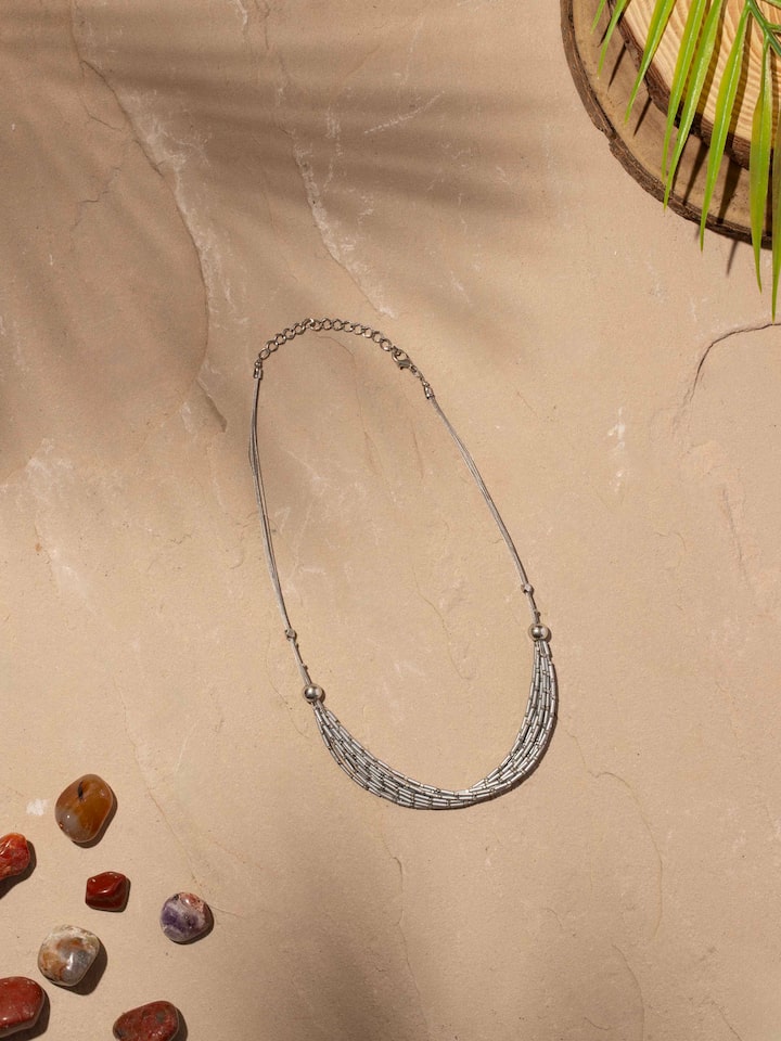 Side view of Handcrafted Collar Necklace showcasing its elegant design.
