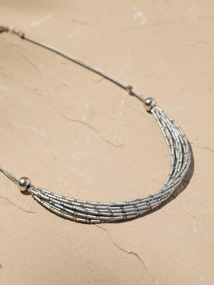 Back view of Handcrafted Collar Necklace highlighting clasp and design details.