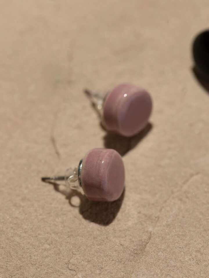 Detail view of Ceramic Stud Earrings Set highlighting the stone setting and metalwork detail