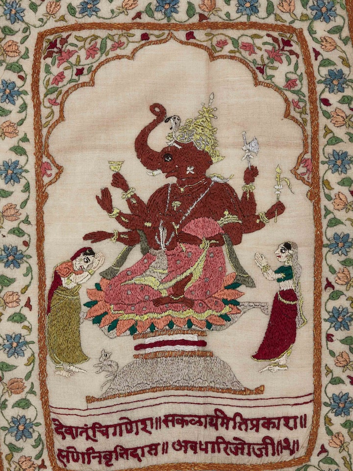 Detailed view of Chamba Rumal Ekdanta wall art emphasizing the intricate embroidery and the use of vibrant colors.
