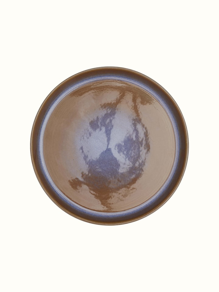Side view of brown Khurja pottery ceramic dinner plates set (4 pcs) showing the ceramic texture