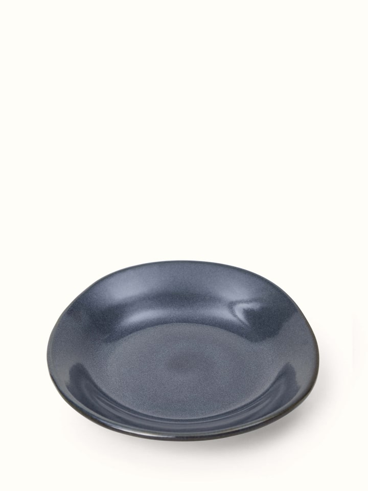 Front view of Khurja pottery ceramic serving bowl black showcasing its sleek black finish and traditional ceramic design