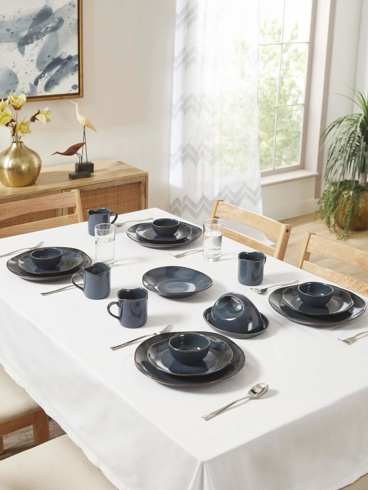 Angled view of Khurja pottery ceramic serving bowl black emphasizing its sleek design and quality craftsmanship