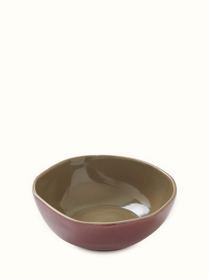 Angled view of Khurja pottery ceramic serving bowls in pink (3 pcs) emphasizing the handcrafted design