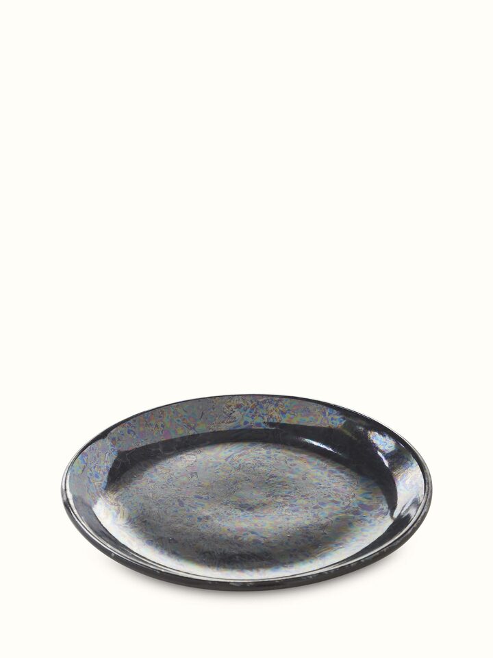 Detailed view of Khurja Pottery Ceramic Salad Plates in black, featuring the glossy surface and intricate craftsmanship