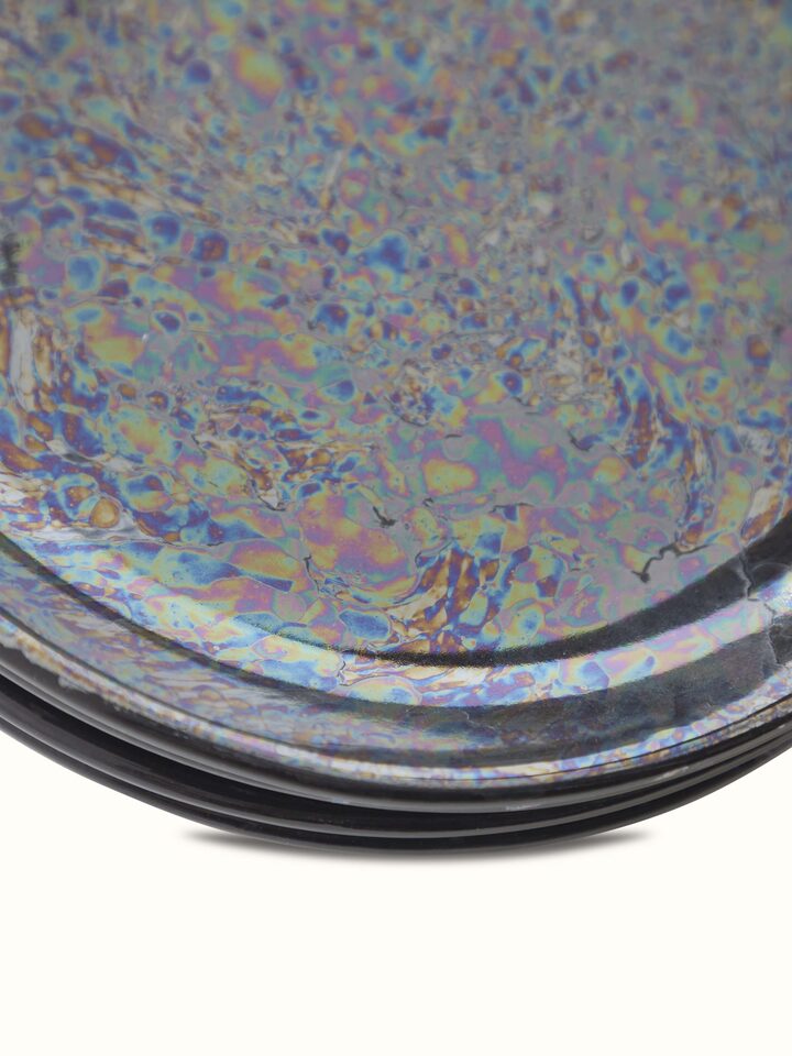 Side angle of Khurja Pottery Ceramic Salad Plates in black, showing the smooth curvature and elegant design