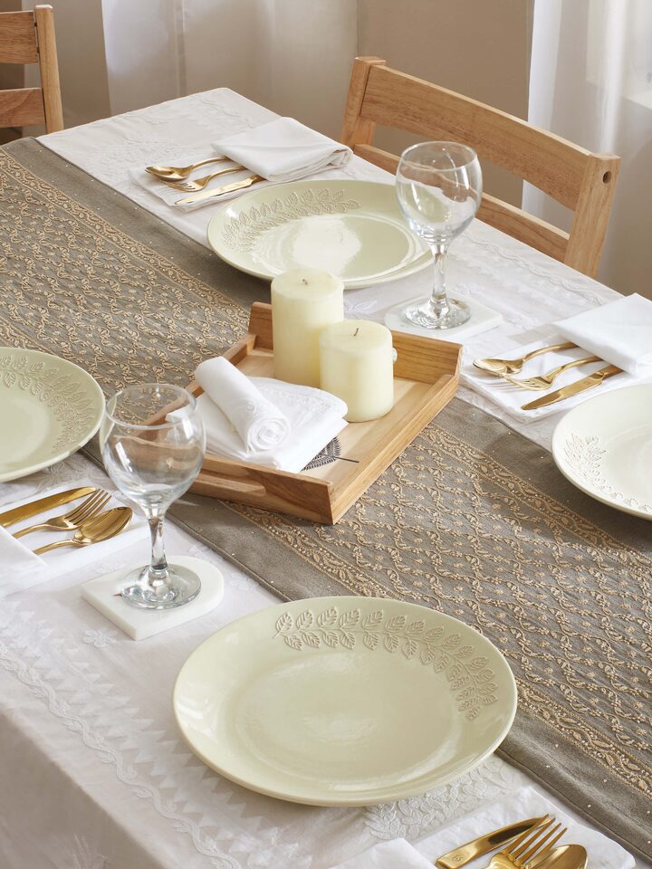 Side view of Khurja Pottery Ceramic Salad Plates in off-white, showing their depth and rim detail.
