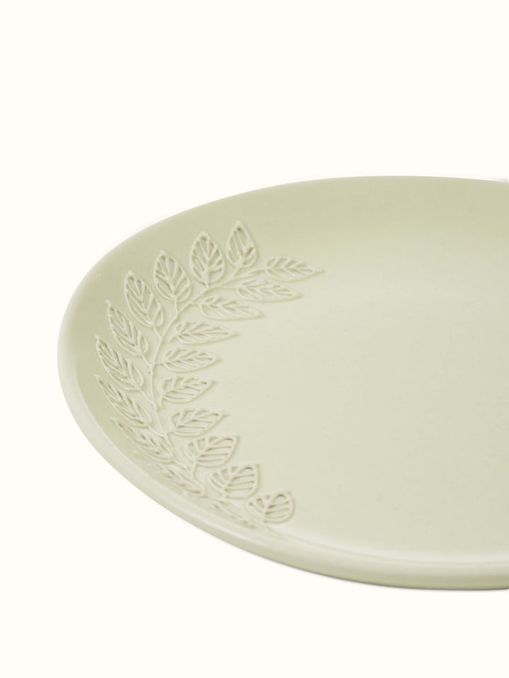 View of Khurja Pottery Ceramic Salad Plates showing their stackability and clean off-white finish.