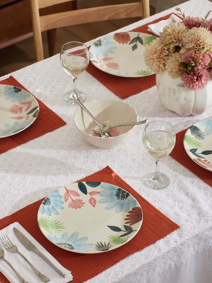 Side view of Khurja Pottery Ceramic Dinner Plates Multicolor (4 pcs), highlighting the plate edges and colors