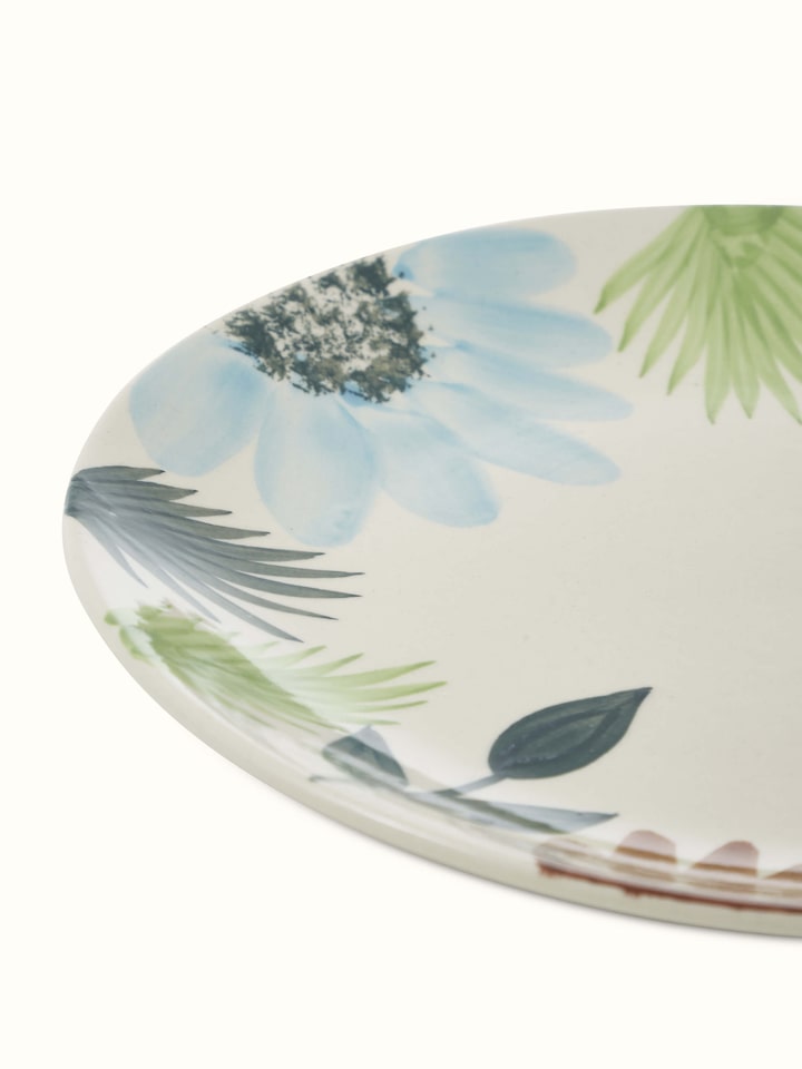 Overhead view of Khurja Pottery Ceramic Dinner Plates Multicolor (4 pcs), arranged to display the pattern variations