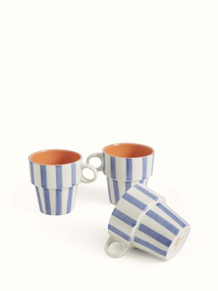 Close-up view of Khurja pottery ceramic coffee mugs in blue & white (4 pcs) emphasizing the craftsmanship and fine details.