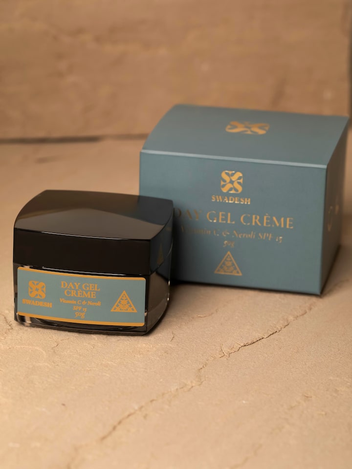 Styled detail view of Day Gel Creme Vitamin C & Neroli SPF 15 shown in another styled setting