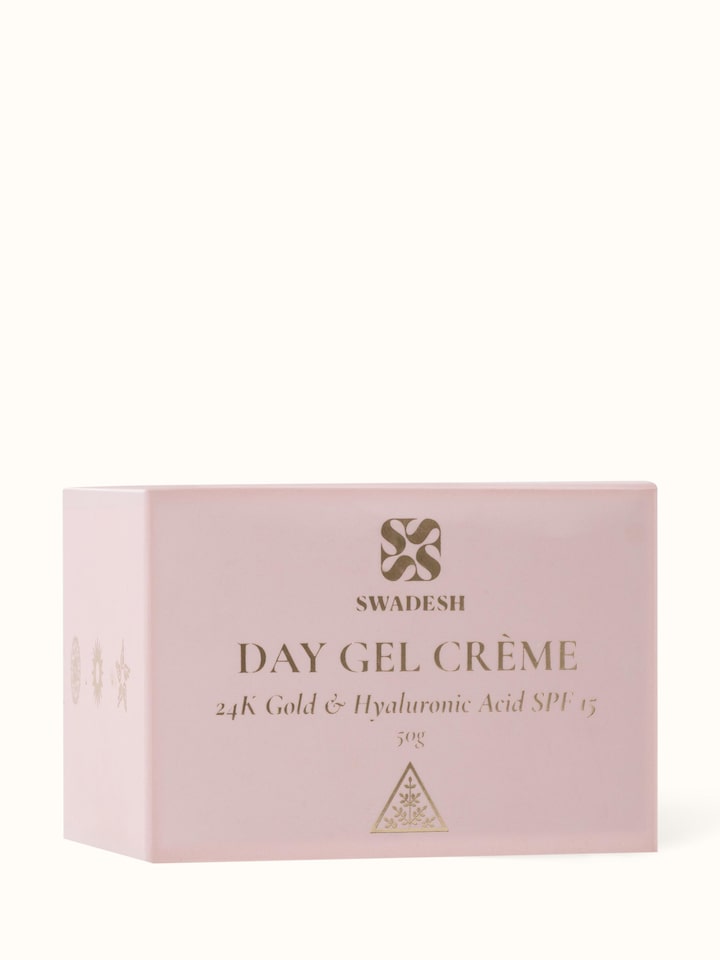 Back view of Day Gel Crème 24K Gold & Hyaluronic Acid SPF 15 showing ingredient list and usage instructions