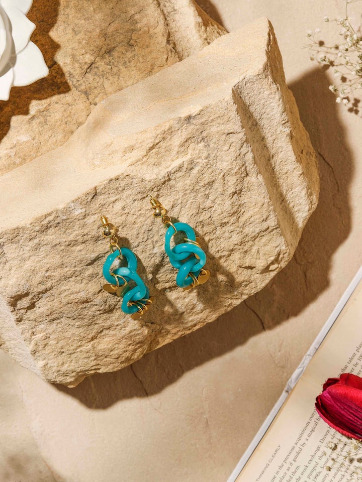 Close-up of Glass bead drop earrings emphasizing beadwork