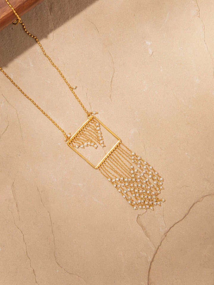 Side view of Silver Smithing Long Necklace showcasing its refined design and craftsmanship.