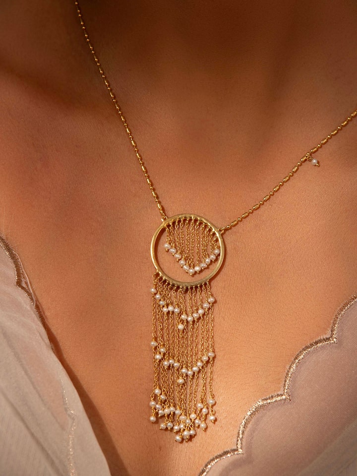 Close-up view of Silver Smithing Long Necklace showcasing fine craftsmanship and silver details.