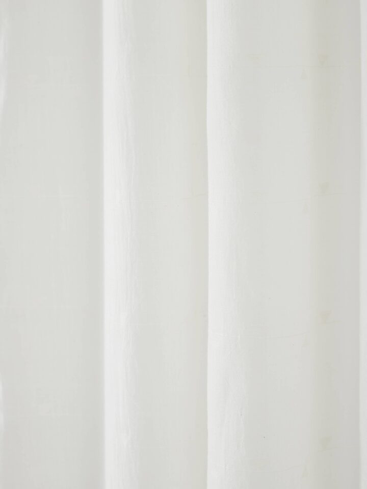 Detailed view of Kalpanama white woven buti handloom cotton curtain (9 ft) focusing on the fabric's texture and woven pattern.