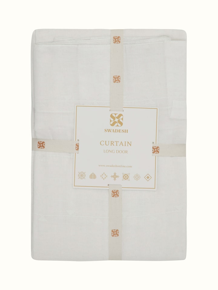 Close-up of Kalpanama white woven buti handloom cotton curtain (9 ft) showing the detailing and craftsmanship of the woven buti.