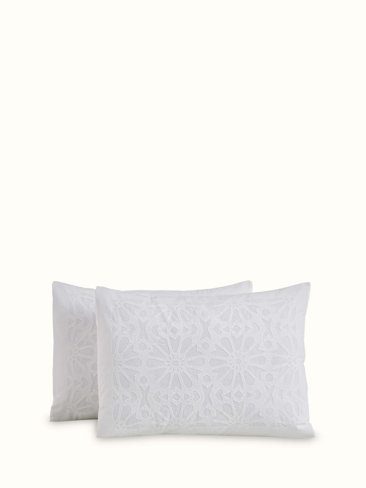 Detailed view of Mandana White Jaali Cotton Appliqué King Bedspread Set (3 pcs), emphasizing the fabric texture and design.