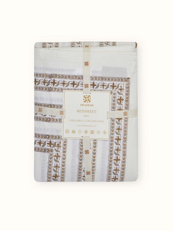 Angled view of Aarunya beige buta cotton Sanganeri block printed king bedsheet set (3 pcs), demonstrating the full design and set.