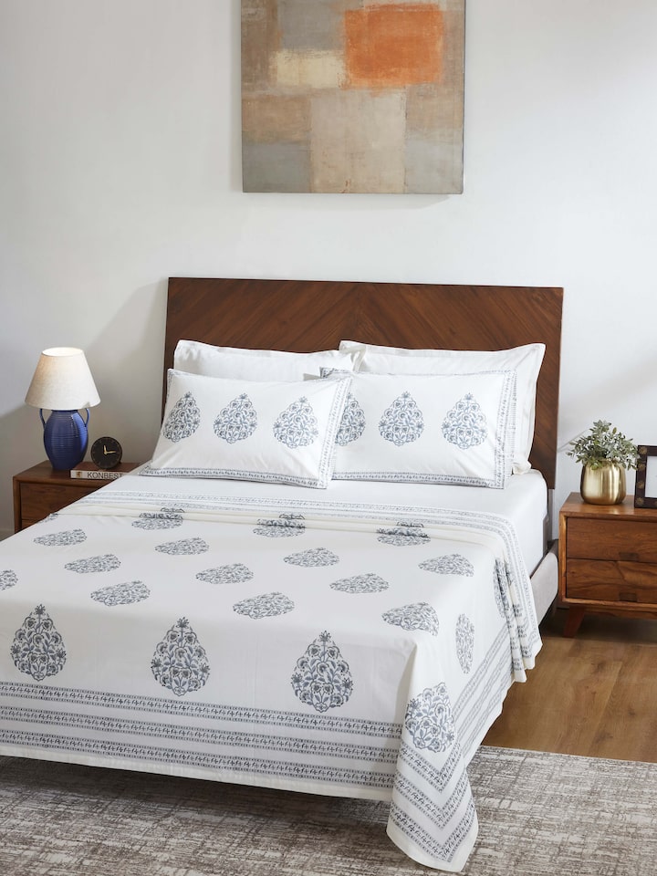 Close-up of Aarunya grey buta cotton Sanganeri bedsheet highlighting the intricate block print details and fabric texture