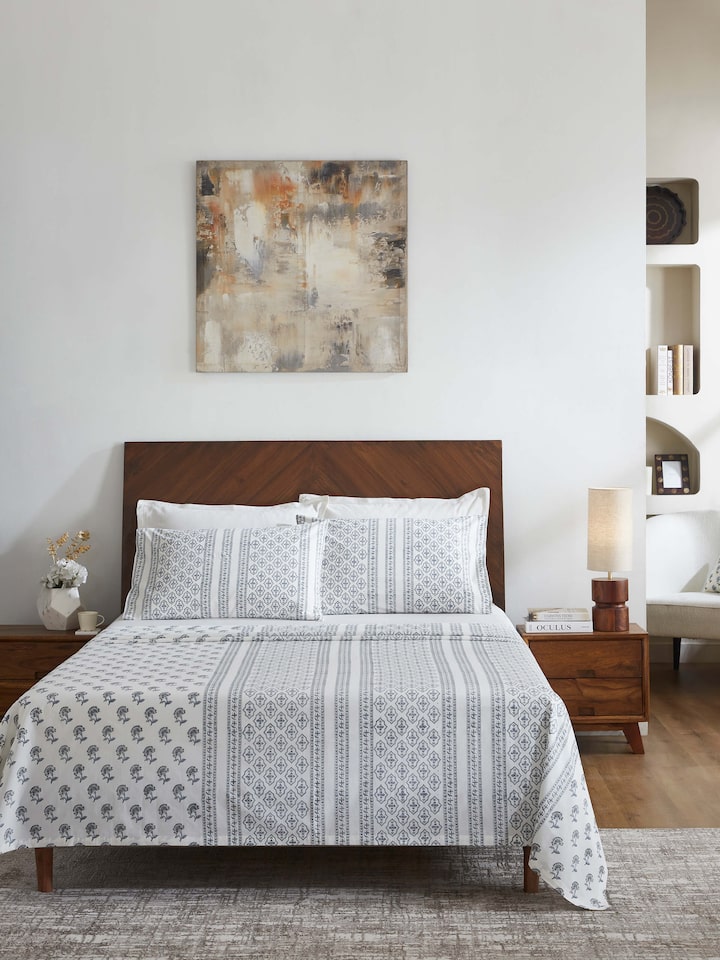 Side view of Aarunya grey floral cotton Sanganeri block printed king bedsheet set emphasizing the detailed block print design
